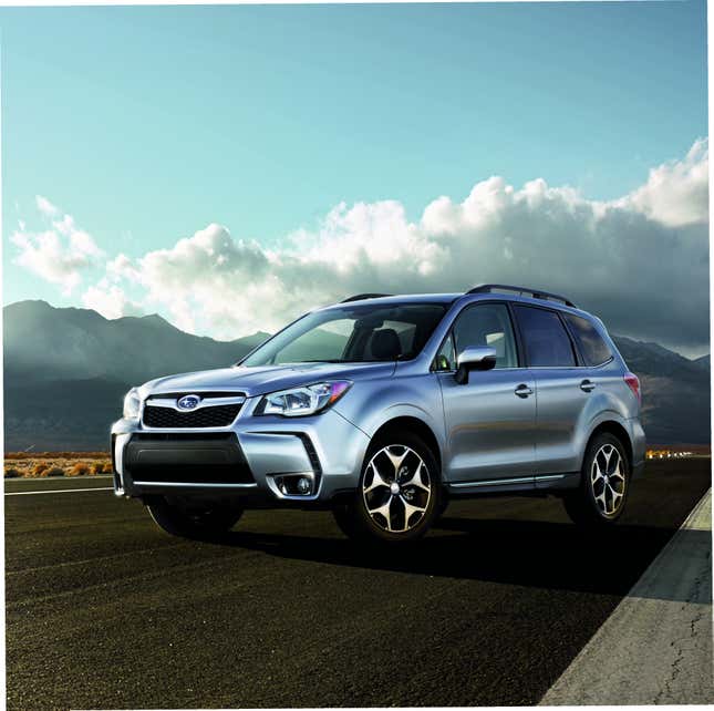 A side-by-side of a silver 2015 Subaru Forester and a blue 2025 Forester