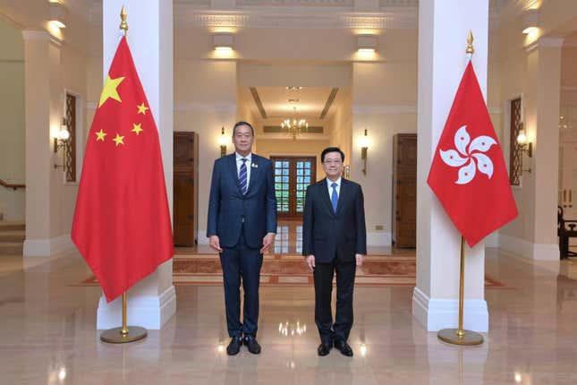 In this photo released by the Hong Kong Government Information Services Department, Hong Kong Chief Executive John Lee, right, and Thailand&#39;s Prime Minister Srettha Thavisin stand for a photograph during their meeting at Government House in Hong Kong on Monday, Oct. 9, 2023. Hong Kong&#39;s leader said Tuesday the city would seek to strengthen its economic and trade ties with Thailand after a meeting with the country&#39;s prime minister, as the Chinese financial hub looks for more business opportunities in Southeast Asia. (Hong Kong Government Information Services Department via AP)