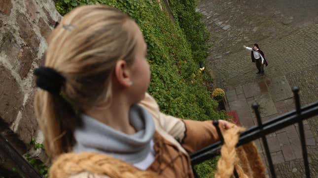 An actress portrays Rapunzel during a German celebration of the Brothers Grimm