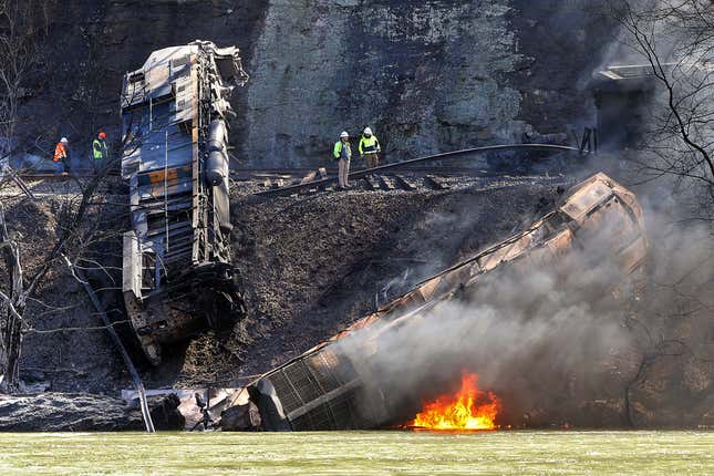 Smoke fills the sky after an empty CSX coal train hit a rockslide along tracks causing a fiery derailment, March 8, 2023, in a remote area just south of Sandstone, W.Va. Transportation Secretary Pete Buttigieg has reiterated his concerns about railroad safety and scolded the industry for not doing more to improve since last year&#39;s fiery Ohio derailment. (Jenny Harnish/The Register-Herald via AP, file)