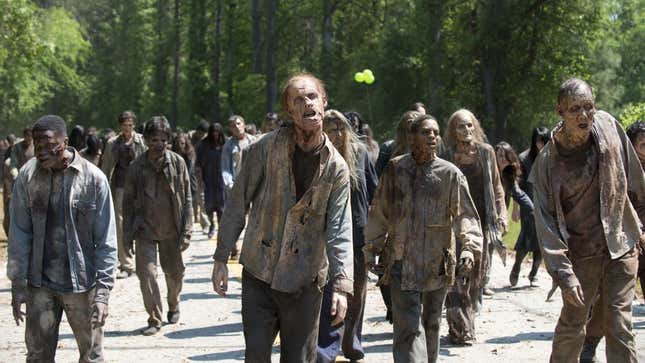 Zombies in AMC's The Walking Dead, walking in the middle of the street. 