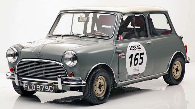 A photo of a grey Mini rally car. 