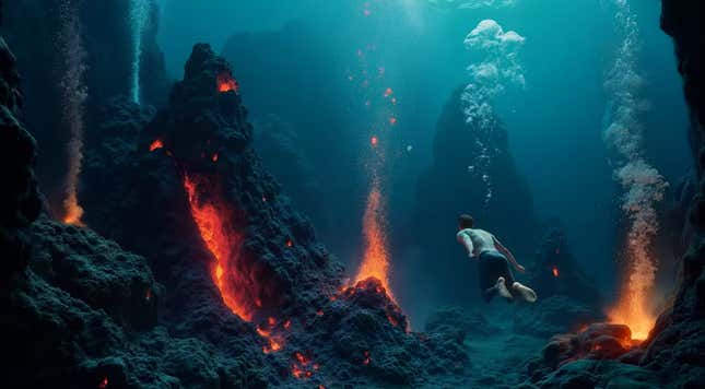 A screenshot shows a person swimming under water. 