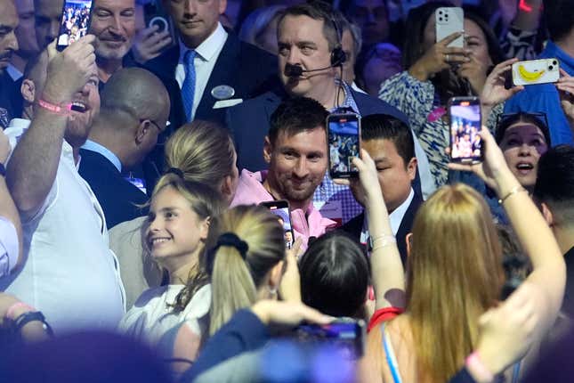 Inter Miami soccer player Lionel Messi walks through the crowd as he arrives for a naming ceremony for Royal Caribbean International&#39;s new cruise ship Icon of the Seas, Tuesday, Jan. 23, 2024, in Miami. The cruise line has named Messi as the official icon of the Icon of the Seas ship. (AP Photo/Lynne Sladky)