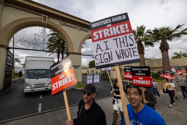 Striking members of the Writers Guild of America picket outside Paramount Studios.