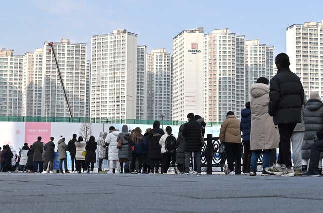 People wait in line to get tests for covid-19 in Seoul, South Korea on December 14, 2021.