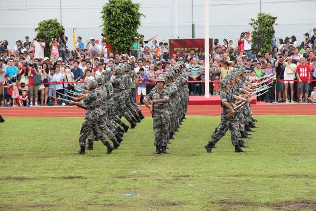 PLA soldiers perform for visitors on July 1, the anniversary of Hong Kong’s handover to Beijing.