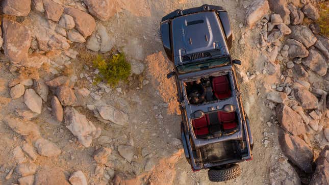 An overhead shot of a Jeep Wrangler in a desert 