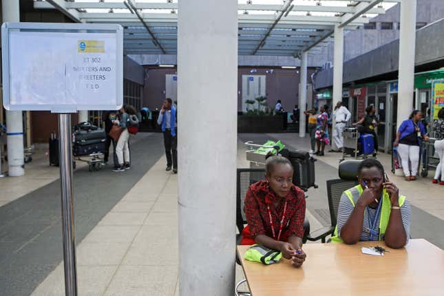 Airport staff wait for relatives at a help desk set up for the crashed Ethiopian Airlines flight ET 302, at the Jomo Kenyatta International Airport (JKIA) in Nairobi, Kenya, 10 March 2019. Ethiopian Airlines Boeing 737 Max 8 en route to Nairobi, Kenya, crashed near Bishoftu, some 50km outside of the capital Addis Ababa, Ethiopia, on 10 March 2019, the airline said in its statement. All passengers onboard the scheduled flight ET 302 carrying 149 passengers and 8 crew members, have died, the airlines says.