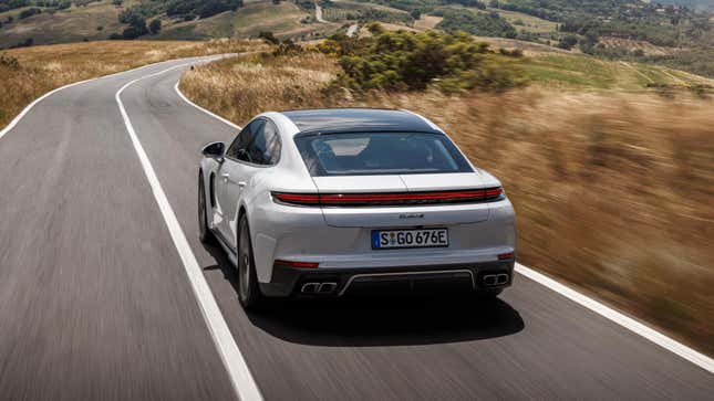 Rear 3/4 view of a white Porsche Panamera Turbo S E-Hybrid