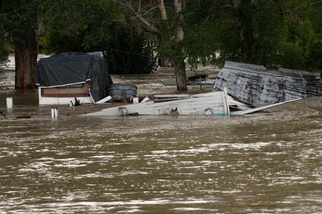 Floodwaters inundated property along the Clarks Fork Yellowstone River near Bridger, Mont, on Monday, June 13, 2022