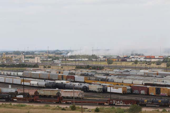 FILE - Smoke emanates from a railroad car after an explosion at Union Pacific&#39;s Bailey Yard, Sept. 14, 2023, in North Platte, Neb. The explosion of a shipping container filled with toxic acid inside the world’s largest railyard, combined with hundreds of rules violations inspectors found there, raises questions about Union Pacific&#39;s safety and the effectiveness of the rules for shipping hazardous materials. The Sept. 14 blast fortunately happened in a remote corner of the railyard and the resulting fire did not spread widely. (Ryan Herzog/The Telegraph via AP, File)