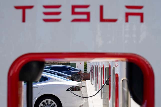 File - Tesla vehicles charge at a station in Emeryville, Calif., Wednesday, Aug. 10, 2022. Tesla reports earnings on Wednesday, Oct. 18, 2023 (AP Photo/Godofredo A. Vásquez, File)