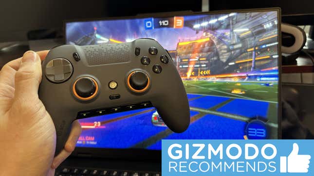A SCUF Envision Pro controller in front of a laptop screen showing Rocket League