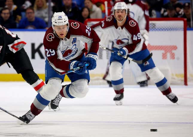 Oct 29, 2023; Buffalo, New York, USA;  Colorado Avalanche center Nathan MacKinnon (29) skates up ice for a loose puck during the first period against the Buffalo Sabres at KeyBank Center.