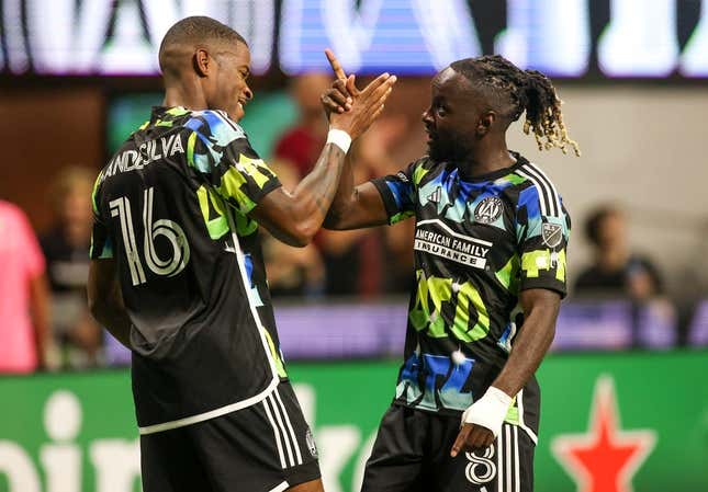 Nov 7, 2023; Atlanta, Georgia, USA; Atlanta United forward 
Xande Silva (16) celebrates with midfielder Tristan Muyumba (8) after scoring a goal in the first half against Columbus Crew at Mercedes-Benz Stadium.