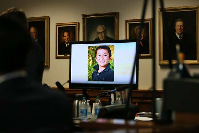 A photo of Sandy Hook victim Jesse Lewis displayed during opening arguments last week. His parents testified in the defamation trial against Alex Jones on Tuesday.