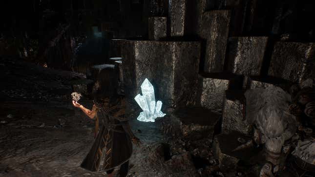 Lune stands in front of a rock crystal.