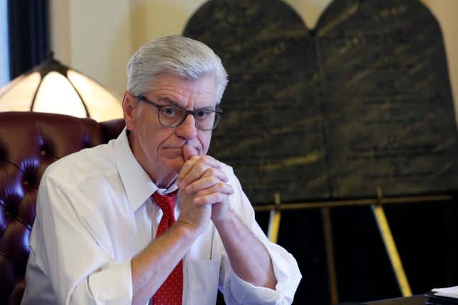 FILE - During his final week in office, Mississippi Republican Gov. Phil Bryant ponders a question in the state Capitol in Jackson, Miss., on, Jan. 8, 2020. Nancy New, who was convicted in 2022 in a welfare misspending case, said in a court filing Feb. 26, 2024, that Bryant told people in 2019, during his final weeks of office, that he had been offered a financial stake in a company that had received welfare money for its effort to develop a concussion drug. (AP Photo/Rogelio V. Solis, File)