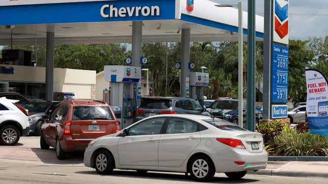 Vehicles line up to get fuel at a gas station on April 17, 2023 in Miami, Florida. 