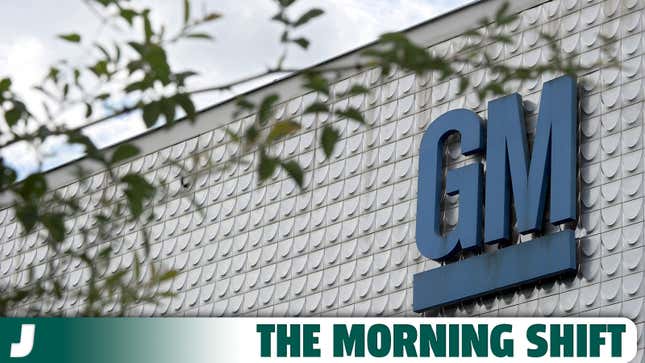 A photo of the General Motors logo on the side of a building. 