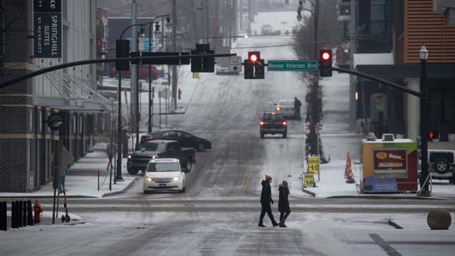 A street with a slight covering of snow in the US 