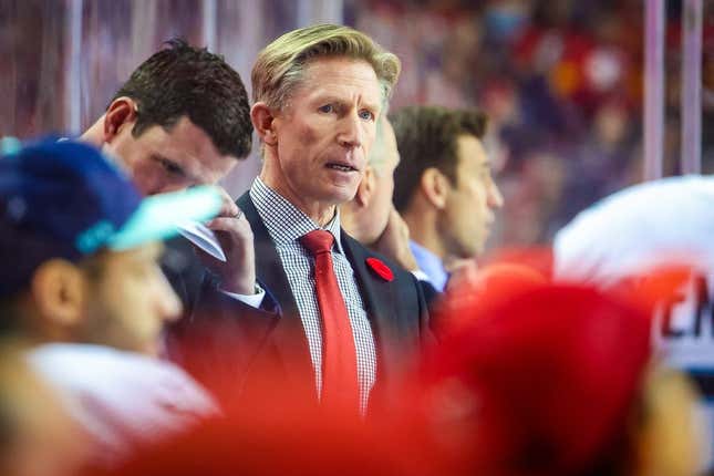 Nov 1, 2022; Calgary, Alberta, CAN; Seattle Kraken head coach Dave Hakstol on his bench against the Calgary Flames during the second period at Scotiabank Saddledome.