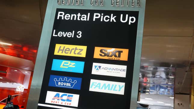 A sign indicates the rental pickup area at the Miami International Airport Car Rental Center on April 12, 2021 in Miami, Florida