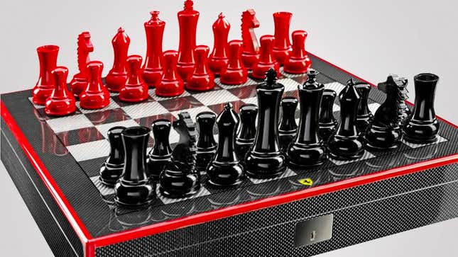 A carbon fiber Ferrari chess set in red and black 