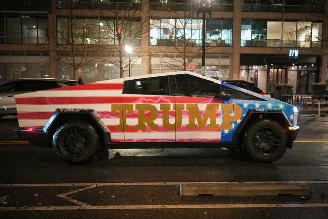 A Donald Trump-adorned Tesla Cybertruck sits in traffic on January 19, 2025 in Washington, DC. U.S.