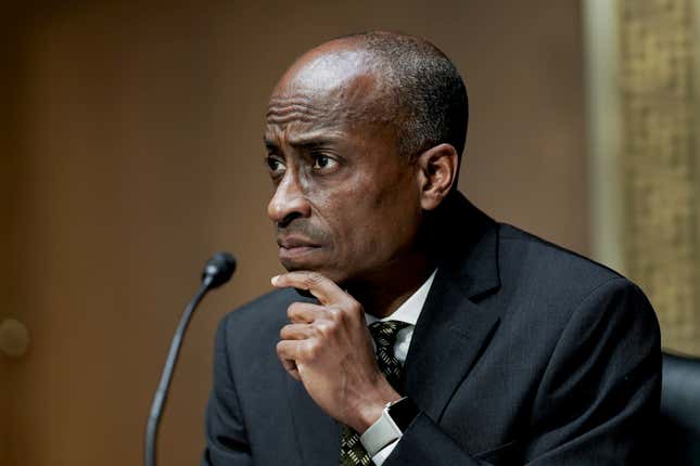 FILE - Philip Jefferson, then-nominee to be a member of the Federal Reserve Board of Governors, listens during a Senate Banking, Housing and Urban Affairs Committee confirmation hearing on Feb. 3, 2022, in Washington. Jefferson, now Federal Reserve Vice Chair, suggested Tuesday, April 16, 2024, that the central bank&#39;s key rate may have to remain at its peak for a while to bring down persistently elevated inflation. (Ken Cedeno/Pool via AP, File)