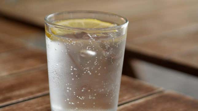 sparkling water in glass on table