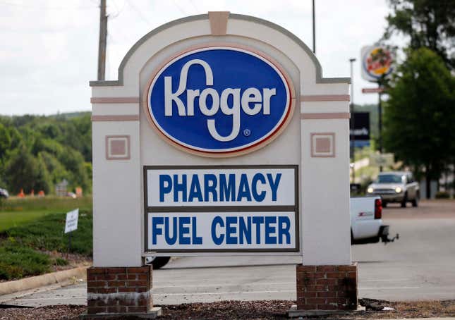 FILE - A Kroger grocery store sign promotes its pharmacy and fuel center at its Flowood, Miss., location, Thursday, June 15 2017. Kroger on Friday, Sept. 8, 2023, announced an agreement to pay up to $1.4 billion to settle lawsuits that claimed the company contributed to the U.S. opioid crisis.(AP Photo/Rogelio V. Solis, File)