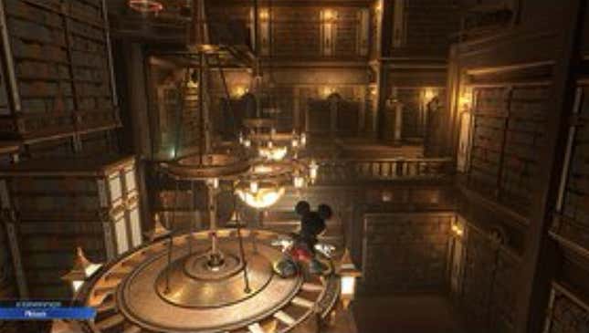 A grainy image of Mickey standing on top of a chandelier.