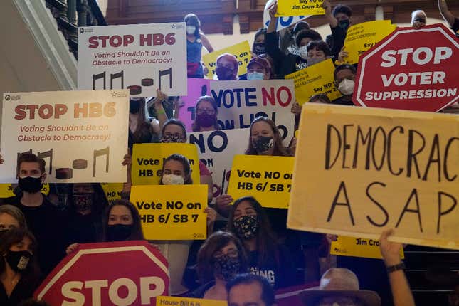 In this May 6, 2021 file photo, a group opposing new voter legislation gather outside the House Chamber at the Texas Capitol in Austin, Texas. Texas Republicans dug in Saturday, May 29, for a final weekend vote on some of the most restrictive new voting laws in the U.S., finalizing a sweeping bill that would eliminate drive-thru voting, reduce polling hours and scale back Sunday voting, when many Black churchgoers head to the polls.