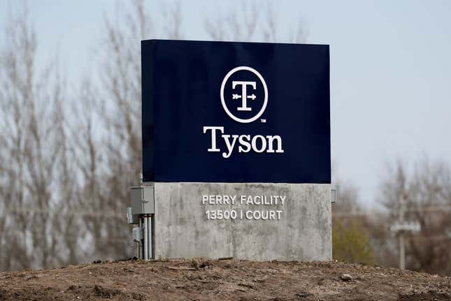 FILE - A sign sits in front of the Tyson Foods pork plant, April 22, 2020, in Perry, Iowa. Tyson Foods will continue streamlining its operations by closing the pork plant in Iowa that employs 1,200 people and eliminating the largest employer in the town of Perry. Tyson announced the plant closure Monday, March 11, 2024. (AP Photo/Charlie Neibergall, File)