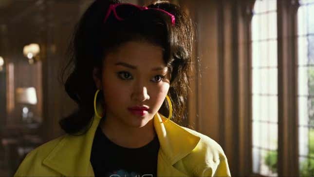 Jubilee stands in the halls of Charles Xavier's mansion.