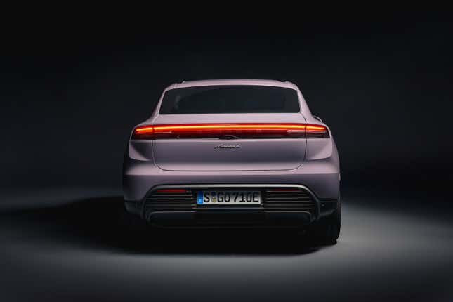 Rear view of a lavender 2024 Porsche Macan EV