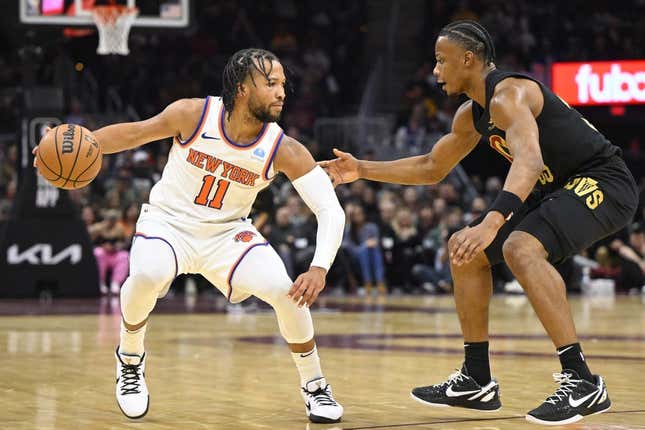 Oct 31, 2023; Cleveland, Ohio, USA; Cleveland Cavaliers forward Isaac Okoro (35) defends New York Knicks guard Jalen Brunson (11) in the second quarter at Rocket Mortgage FieldHouse.