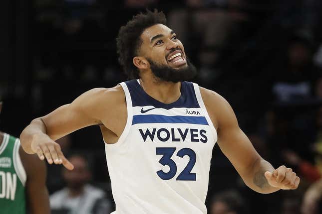 Nov 6, 2023; Minneapolis, Minnesota, USA; Minnesota Timberwolves center Karl-Anthony Towns (32) reacts to fouling out of the game against Boston Celtics in overtime at Target Center.