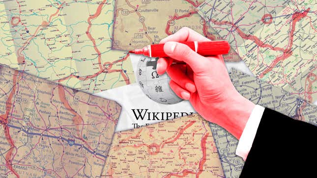 A hand tracing roads on maps laid over the Wikipedia logo