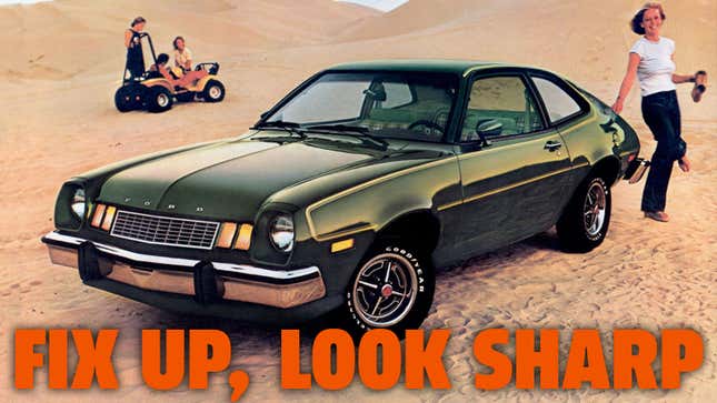 A photo of a green ford pinto parked on sand. 