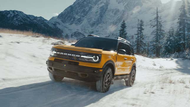 A 2022 Ford Bronco Sport driving along a snowy trail.