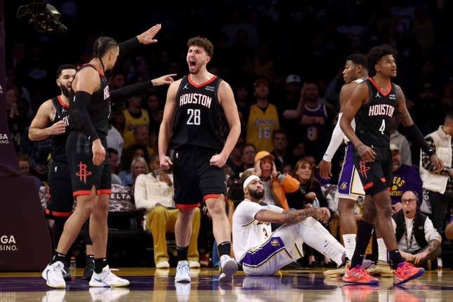 LOS ANGELES, CALIFORNIA - NOVEMBER 19: Alperen Sengun #28 of the Houston Rockets reacts after an offensive charge call against Anthony Davis #3 of the Los Angeles Lakers during the fourth quarter at Crypto.com Arena on November 19, 2023 in Los Angeles, California. NOTE TO USER: User expressly acknowledges and agrees that, by downloading and or using this photograph, User is consenting to the terms and conditions of the Getty Images License Agreement. (Photo by Katelyn Mulcahy/Getty Images)