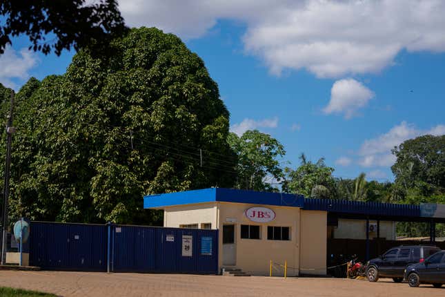 FILE - The main entrance of the meat processing company JBS is visible in Porto Velho, Rondonia state, Brazil, Wednesday, July 12, 2023. Some lawmakers and environmental groups are opposed to JBS being listed on the New York Stock Exchange, arguing that expanded capital would allow the company, responsible for much deforestation in the Amazon rainforest, to do even more harm. (AP Photo/Andre Penner, File)