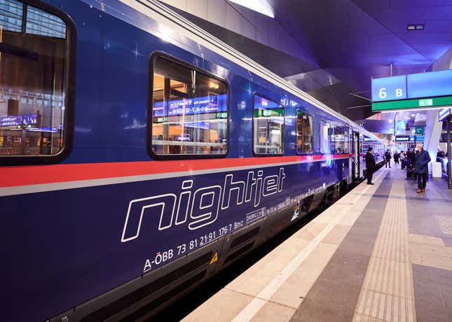 This image released by ÖBB shows a Nightjet sleeper train at a station in Vienna, Austria. A growing number of climate-conscious Europeans are giving up flying in favor of long-haul trains. (Marek Knopp/ÖBB via AP)