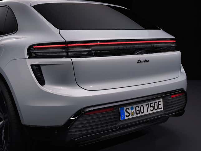 The rear end of a white 2024 Porsche Macan EV