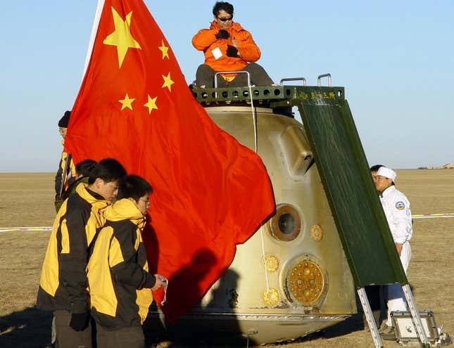 The mission was a success, and the astronauts landed safely in China’s Inner Mongolia Autonomous Region. Here, Chinese technicians check the reentry capsule after its successful landing.