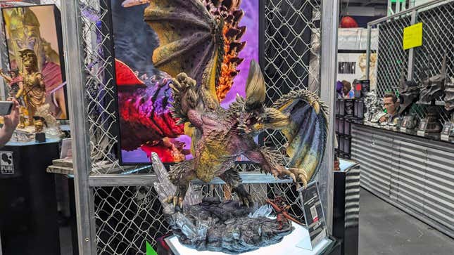 A statue of a monster from Monster Hunter is on display at Comic Con.