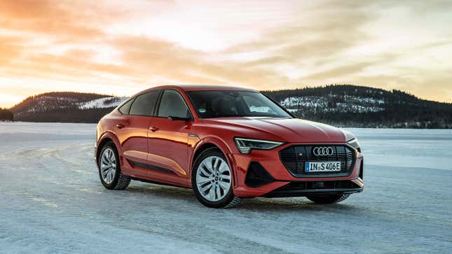 A photo of a red Audi e-tron Sportback. 